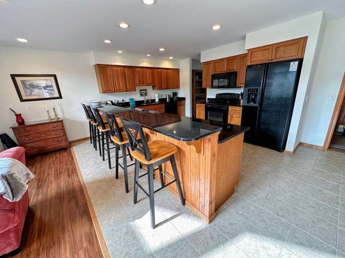 Large kitchen with barstools