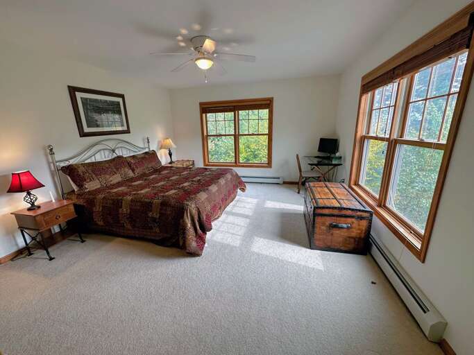Upper Level King Bedroom with desk and private bath