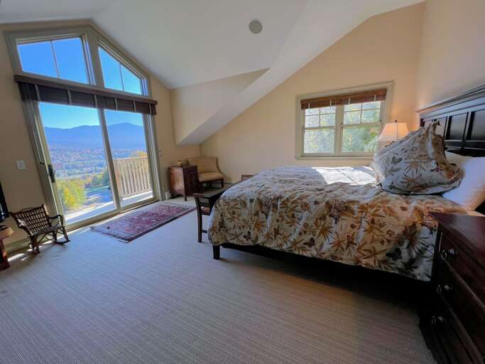 Upper Level Bedroom with King bed, TV, Fireplace and Private Bath