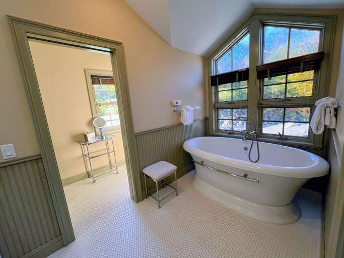 Upper level King bedroom private bath with soaking tub and shower