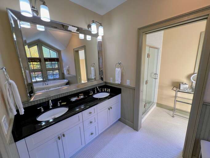 Upper level King bedroom private bath with soaking tub and shower Upper level King bedroom private bath with soaking tub and shower