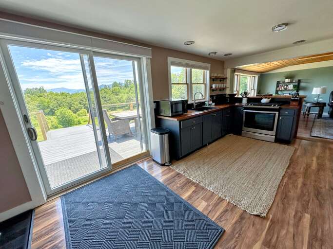 Kitchen with walkout slider to back deck