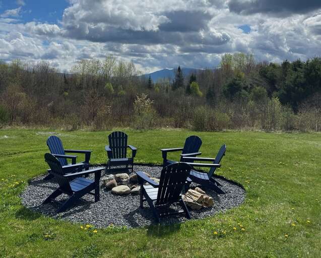 Back yard fire pit for roasting smores in the evening!