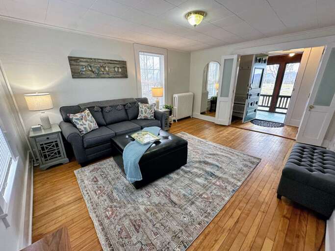 Main Level Den with Pull-Out sofa and full length mirror Main Level Den with Pull-Out sofa and full length mirror