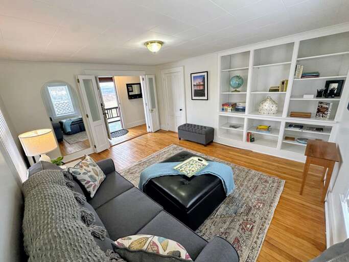 Main Level Den with Pull-Out sofa and full length mirror Main Level Den with Pull-Out sofa and full length mirror