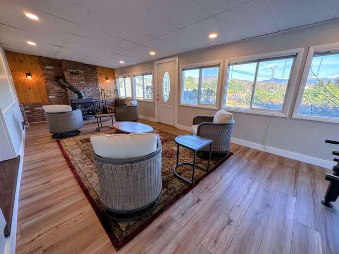 4-season porch with fireplace, foosball and air hockey