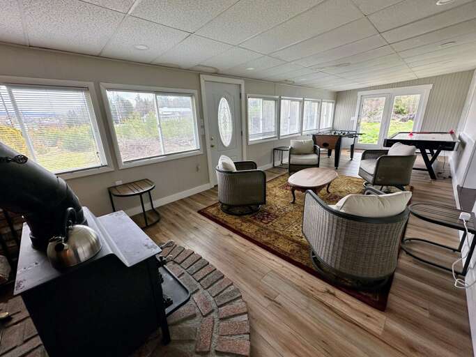 4-season porch with fireplace, foosball and air hockey
