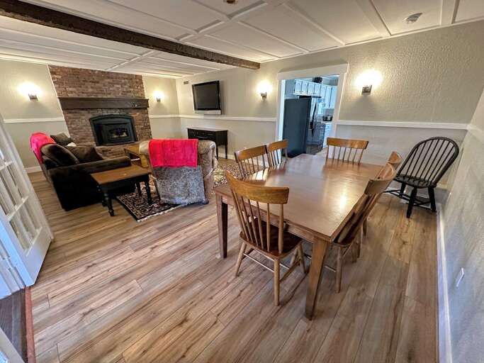 Living room with pellet stove, TV and dining area