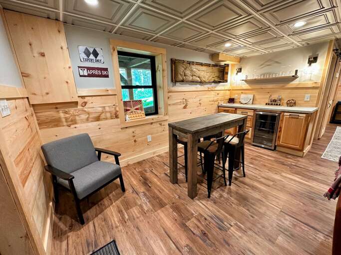 Lower level dry bar and table.