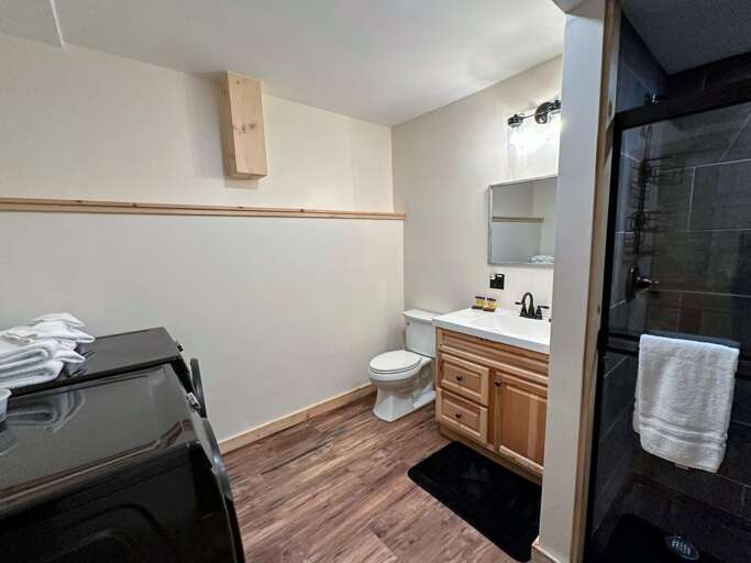 Lower Level Full Bath with Shower and Laundry