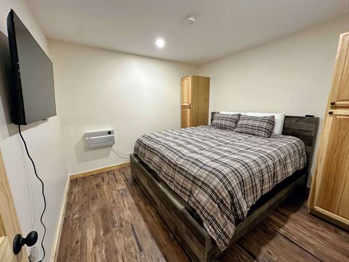 Lower Level King Bedroom with TV