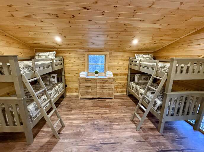 Two Twin-over-Twin bunks in loft