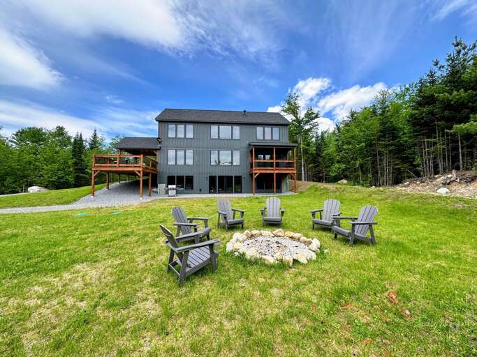 Fire pit with Adirondack chairs