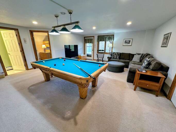Lower level family room with Pool Table and TV