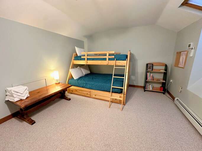Loft area with two Twin-over-Full bunk beds and AC. A TV is set up with access to a VCR/DVD player. Loft area with two Twin-over-Full bunk beds and AC. A TV is set up with access to a VCR/DVD player.