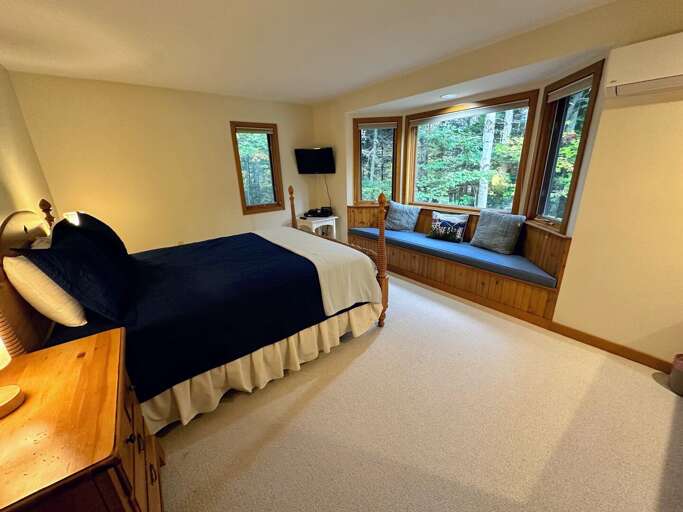 Main level bedroom with TV and AC Main level bedroom with TV and AC