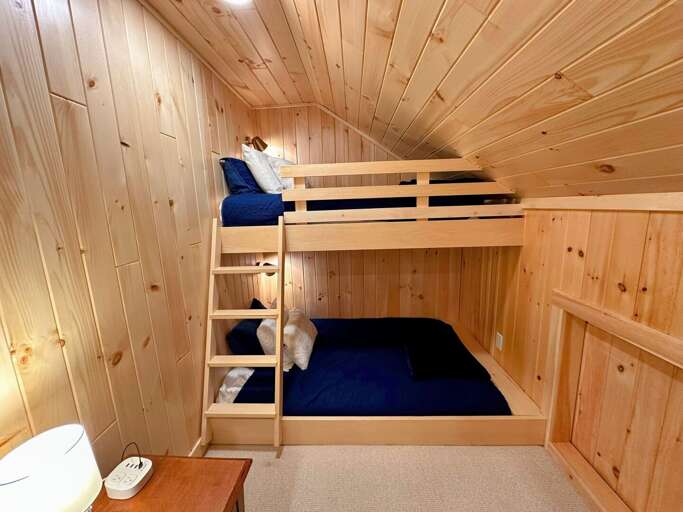 Twin-over-Full bunk bed in loft