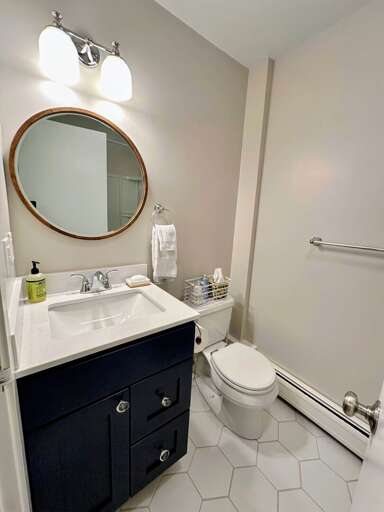 Upper level shared full bath