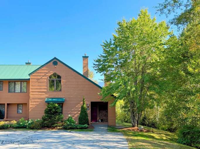 Spacious 5-bedroom end unit Mount Washington Place condo is just across the main road from the Bretton Woods Ski Area! Mountains in the background for partial views. Spacious 5-bedroom end unit Mount Washington Place condo is just across the main road from the Bretton Woods Ski Area! Mountains in the background for partial views.