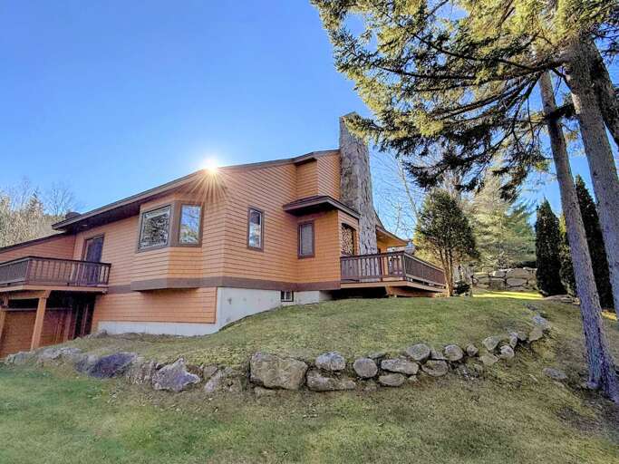 Sunlit Siding, Stone-studded Slope, Serene Setting Sunlit Siding, Stone-studded Slope, Serene Setting