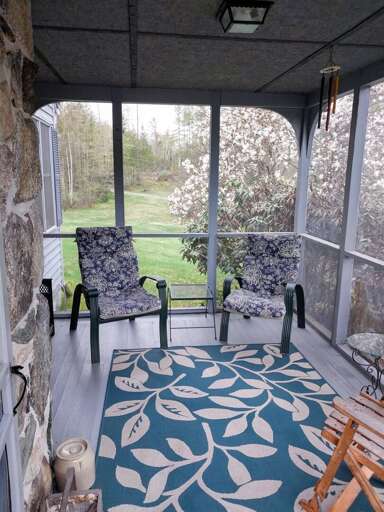 Cozy screened-in porch for those warm-season evenings