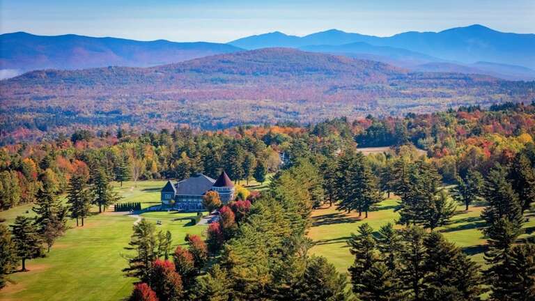 Vivid Vista Of Verdant Valley With Rustic Retreats Amidst Autumnal Hues