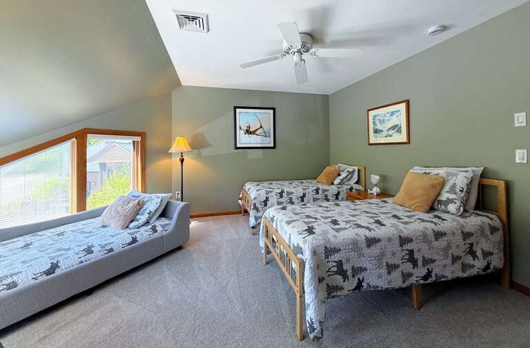 Upper Level Bedroom with 3 Twin Beds.