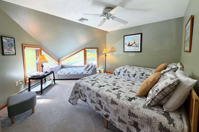 Upper Level Bedroom with 3 Twin Beds.
