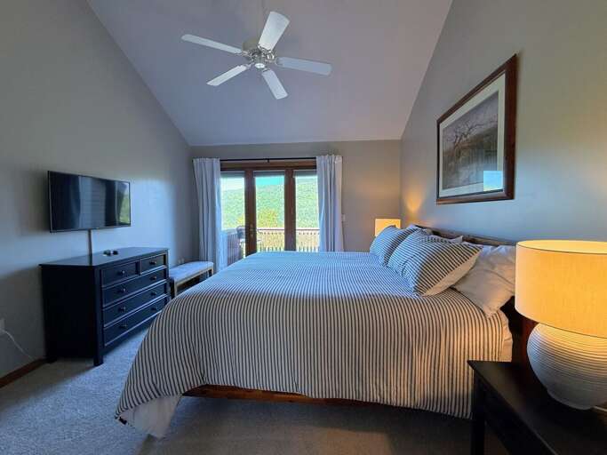 Upper Level Bedroom with a King bed, access to shared bathroom and private deck