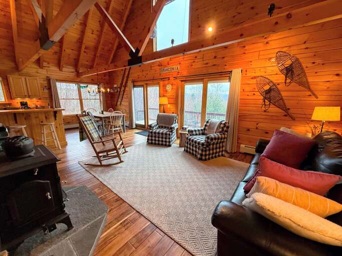 This bright open-concept living room offers plenty of natural sunlight. This bright open-concept living room offers plenty of natural sunlight.