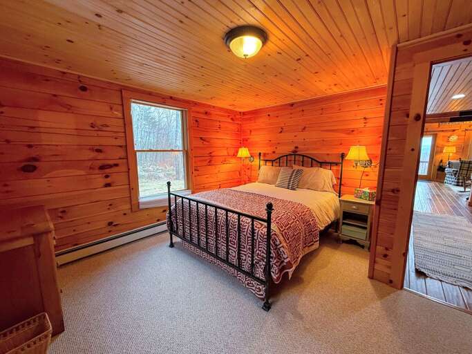 Lovely bedroom with a Queen bed on the entry level Lovely bedroom with a Queen bed on the entry level