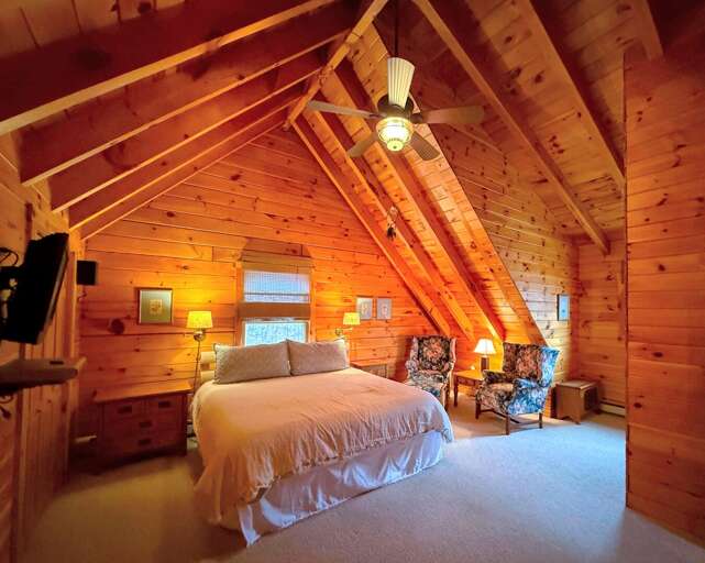 On the upper-level, you'll find a King suite with a private bathroom On the upper-level, you'll find a King suite with a private bathroom