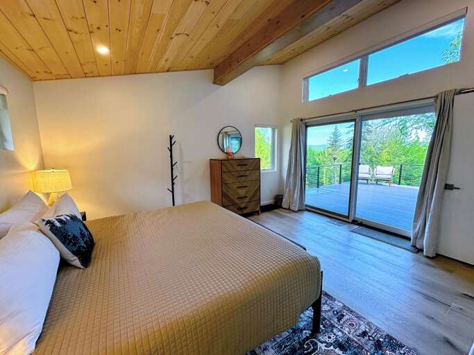 Two identical bedrooms with King bed and bathroom with shower