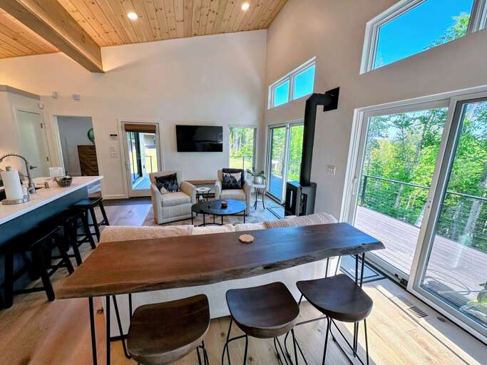 Open concept kitchen/living/ dining room with Jotul stove