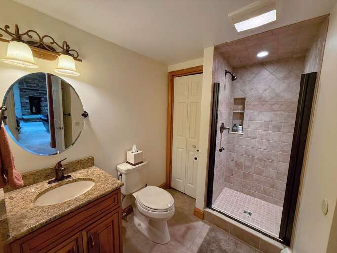 Main level bathroom with shower