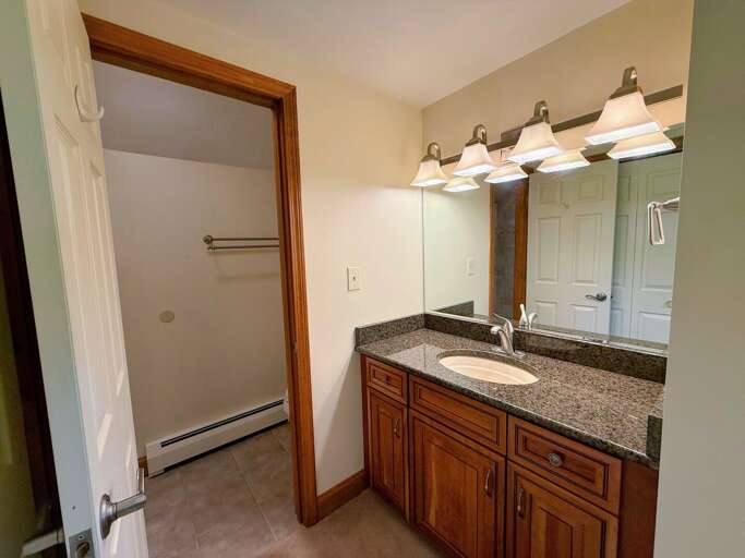 Upper level ensuite bathroom with shower