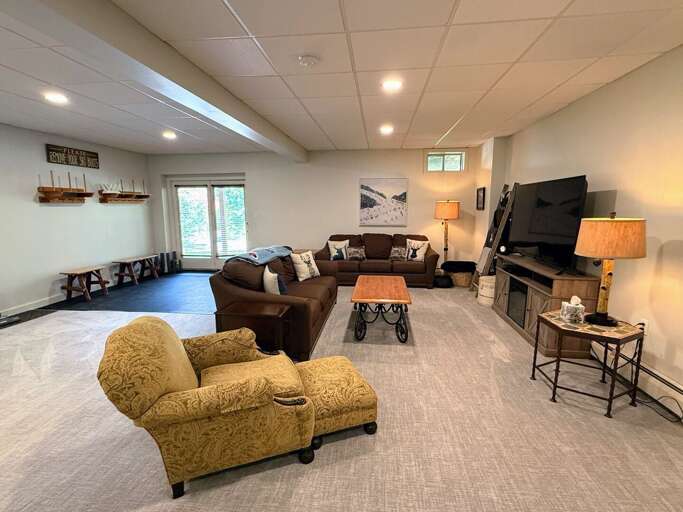 The spacious downstairs living area gives your group a second place to spread out and relax.