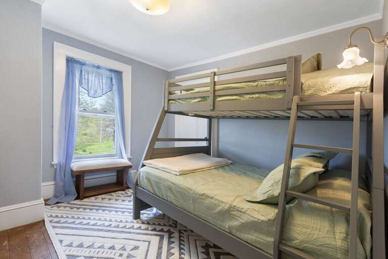 Bedroom with a Twin-over-Full bunk bed