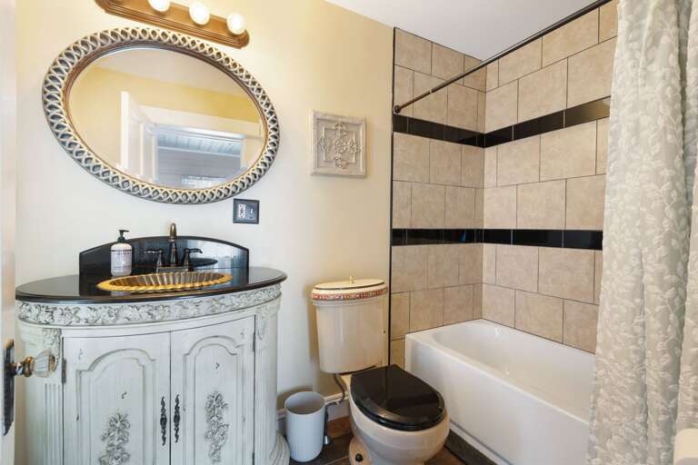 Another charming bathroom with modern touches