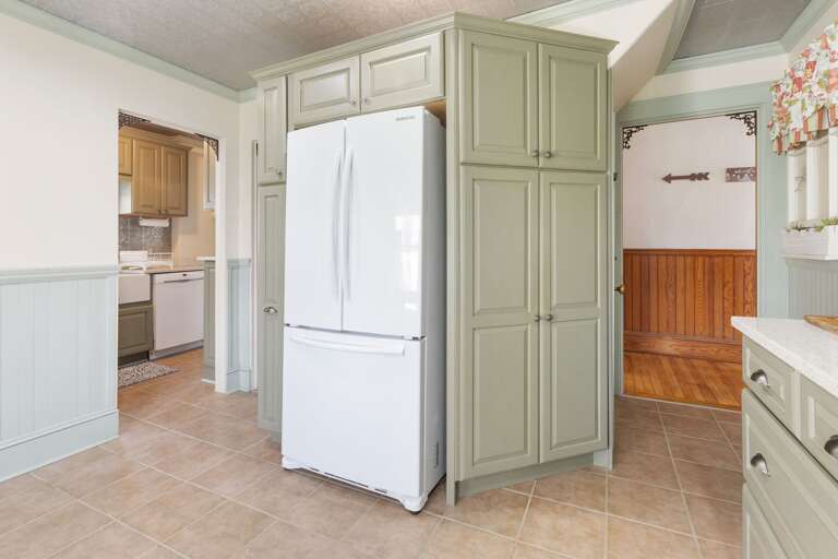Enjoy the modern amenities like a fully equipped kitchen.