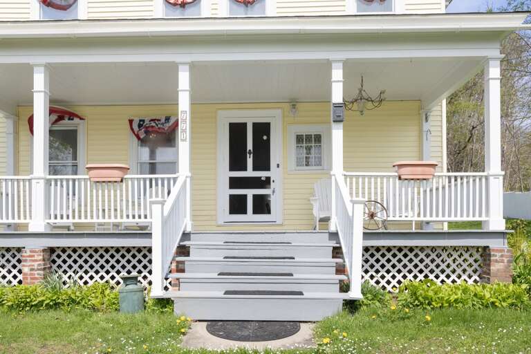 Sip your morning coffee on the covered front porch and take in the peaceful mountain air.