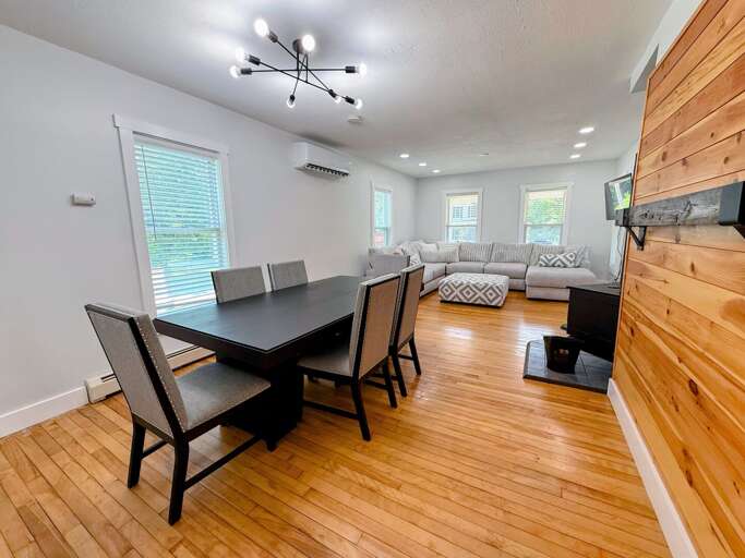 Living and dining areas are adjacent to one another.