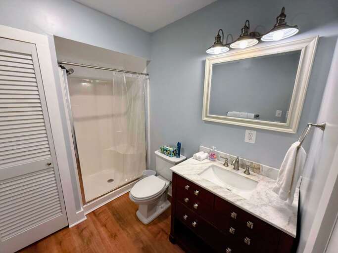 Main level bathroom with shower.
