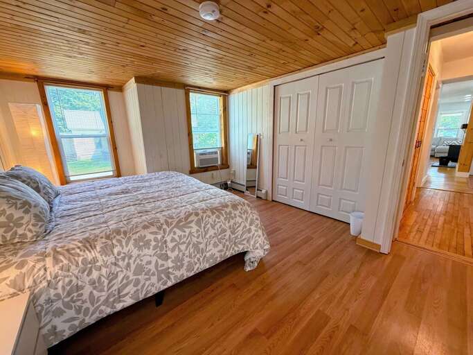 Main level bedroom with king bed.