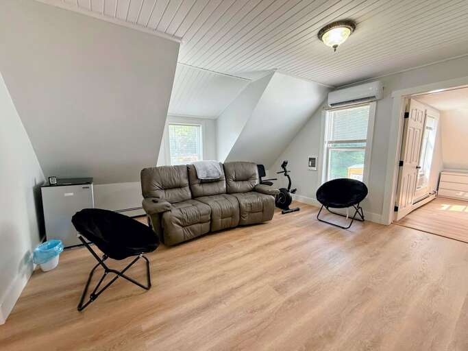 Upper level living area with TV.