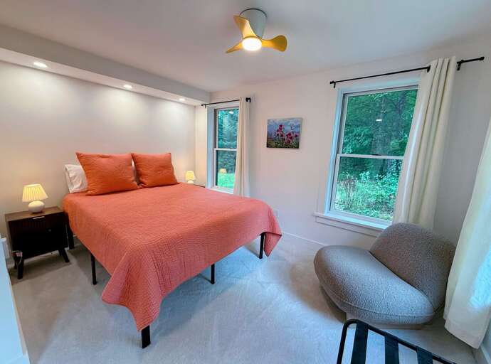 Main Floor Queen Bedroom with ensuite full bath