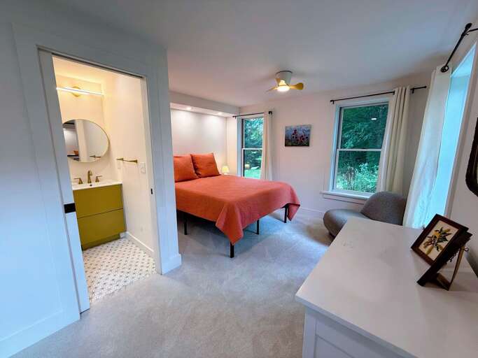 Main Floor Queen Bedroom with ensuite full bath