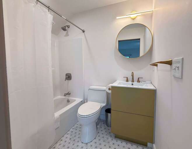 Upper level Queen + Twin (2) ensuite full bath with shower/tub combo