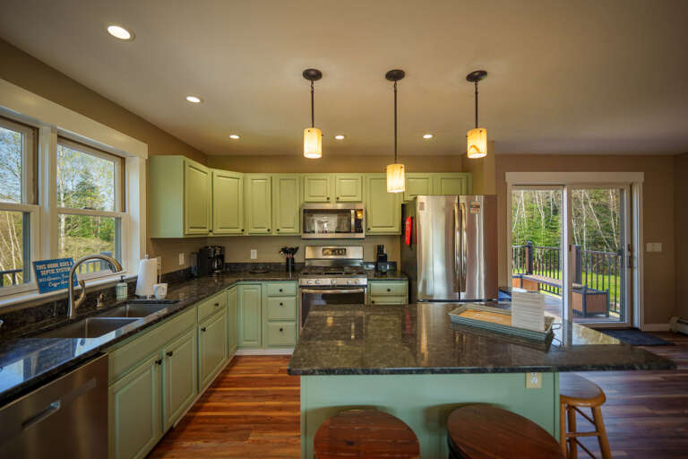 The large kitchen makes it easy to cook a meal for a large group - and there's even a second kitchen downstairs!