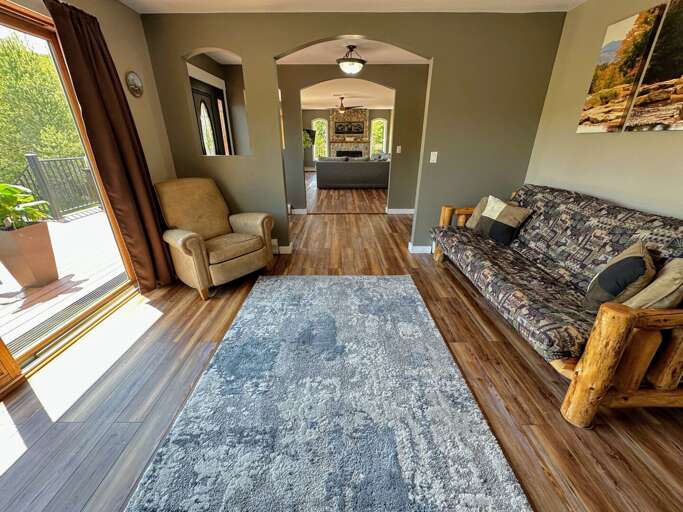 A separate living area, across from the living room, provide a quieter space for those looking for a spot to cozy up with a book while enjoying the electric fireplace and the stunning view.